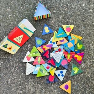 Colorful Triangle Puzzle Pieces about fruits